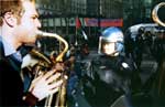 Susaphone and riot gear